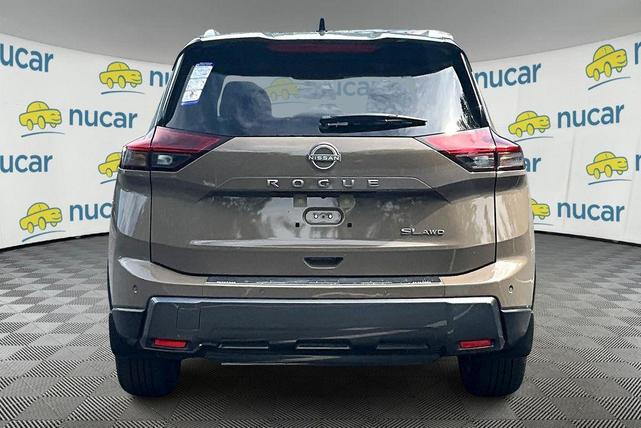 Photo of 2025 2t Dk Beige Blk Nissan Rogue