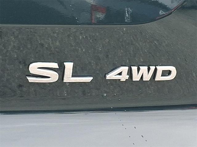 Photo of 2025 2t Grn Blk Roof Nissan Pathfinder
