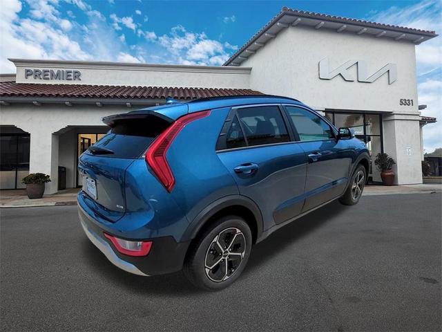Photo of 2025 Mineral Blue Kia Niro