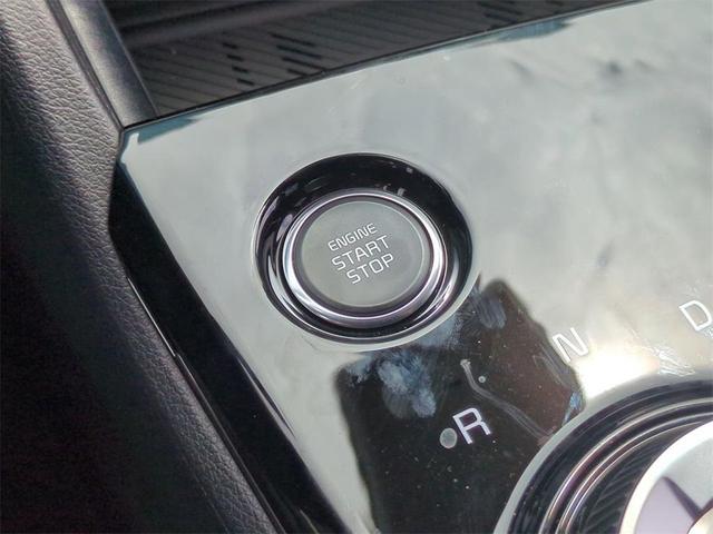 Photo of 2025 Snow White Pearl Kia Sportage Plug-In Hybrid