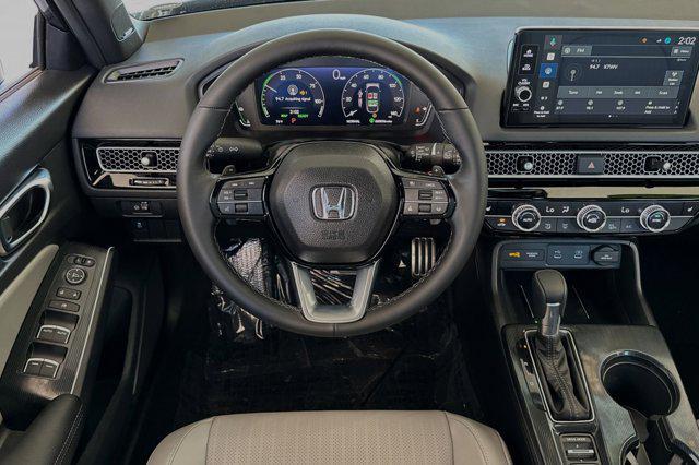 Photo of 2025 Platinum White Pearl Honda Civic Hybrid