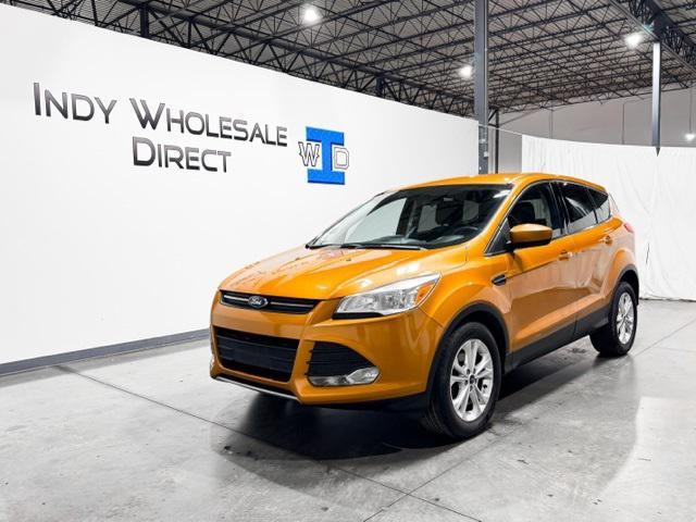Photo of 2016 Electric Spice Metallic Ford Escape