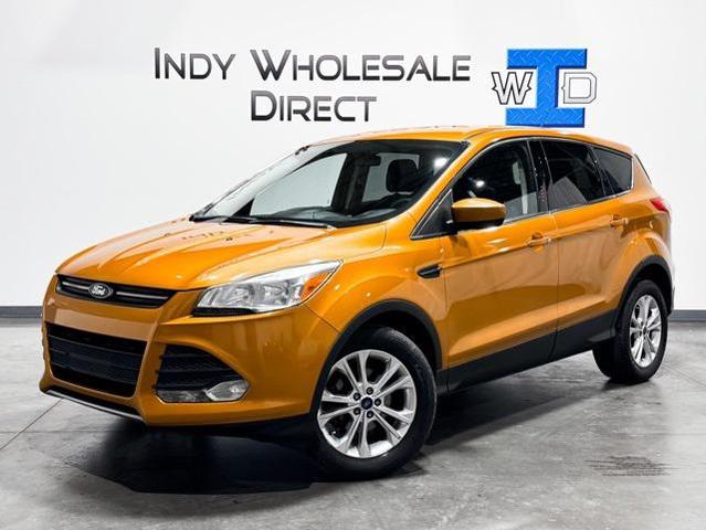 Photo of 2016 Electric Spice Metallic Ford Escape