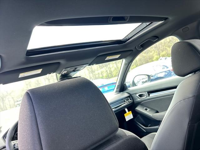Photo of 2025 Boost Blue Pearl Honda Civic Hybrid