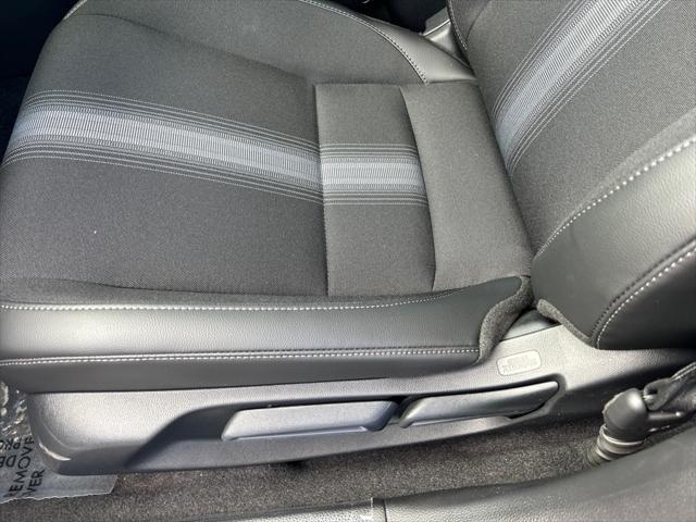 Photo of 2025 Boost Blue Pearl Honda Civic Hybrid