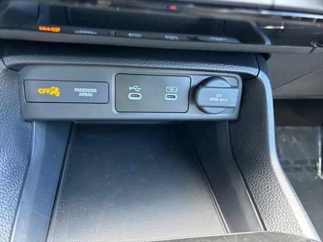 Photo of 2025 Boost Blue Pearl Honda Civic Hybrid