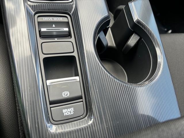 Photo of 2025 Boost Blue Pearl Honda Civic Hybrid