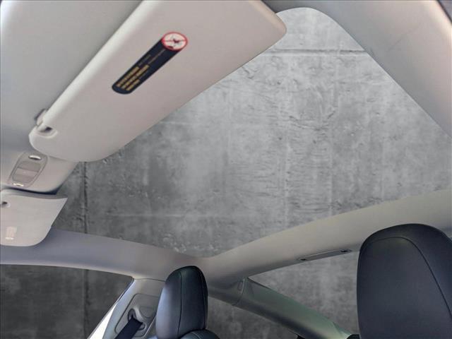 Photo of 2021 Pearl White Multi-Coat Tesla Model 3