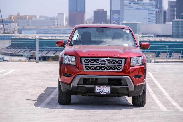 Photo of 2024 Cardinal Red Metallic Nissan Frontier