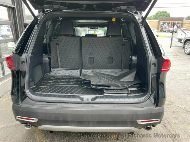 Photo of 2024 Midnight Black Metallic Toyota Grand Highlander Hybrid
