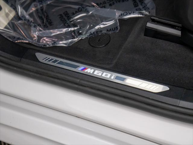 Photo of 2024 Mineral White Metallic BMW X5