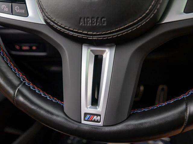 Photo of 2024 Mineral White Metallic BMW X5