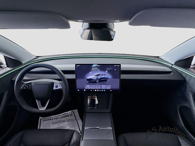 Photo of 2025 Black Tesla Model 3