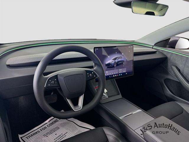 Photo of 2025 Black Tesla Model 3