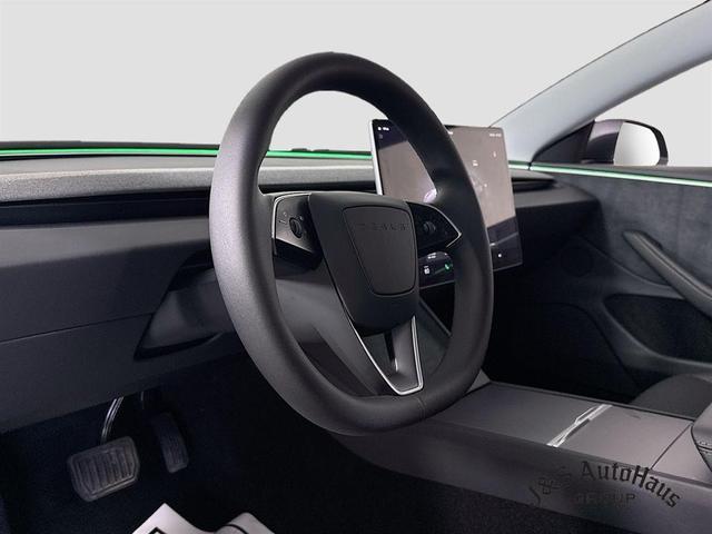 Photo of 2025 Black Tesla Model 3
