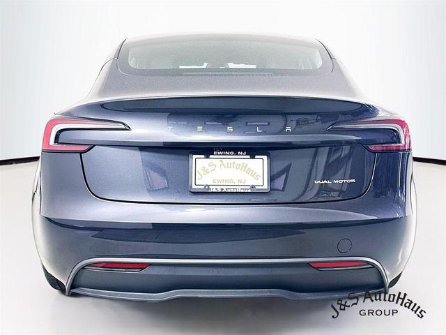 Photo of 2025 Black Tesla Model 3