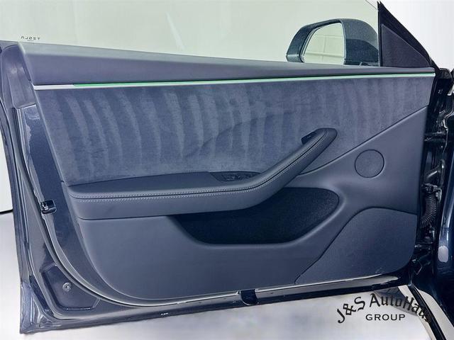 Photo of 2025 Black Tesla Model 3