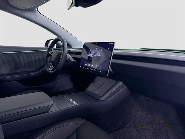 Photo of 2025 Black Tesla Model 3