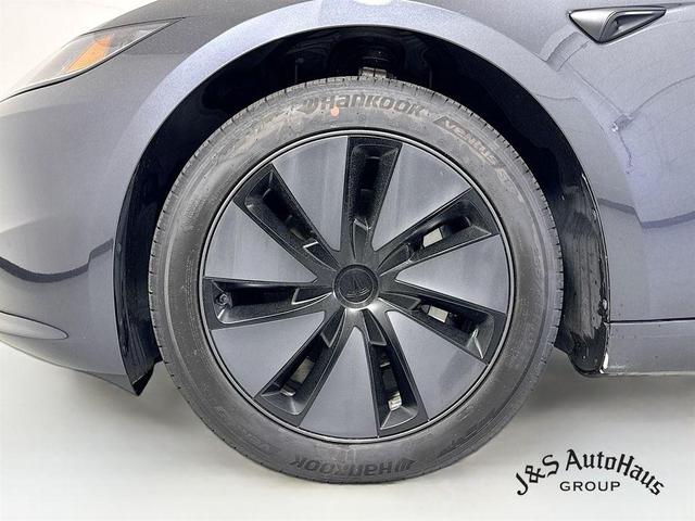 Photo of 2025 Black Tesla Model 3