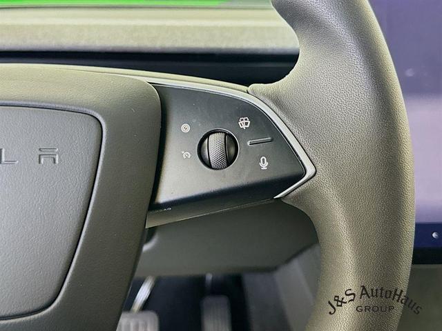 Photo of 2025 Black Tesla Model 3