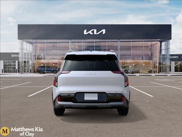Photo of 2026 White Pearl Kia EV9