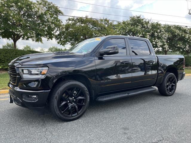 Photo of 2023 Diamond Black Crystal Pearlcoat RAM 1500