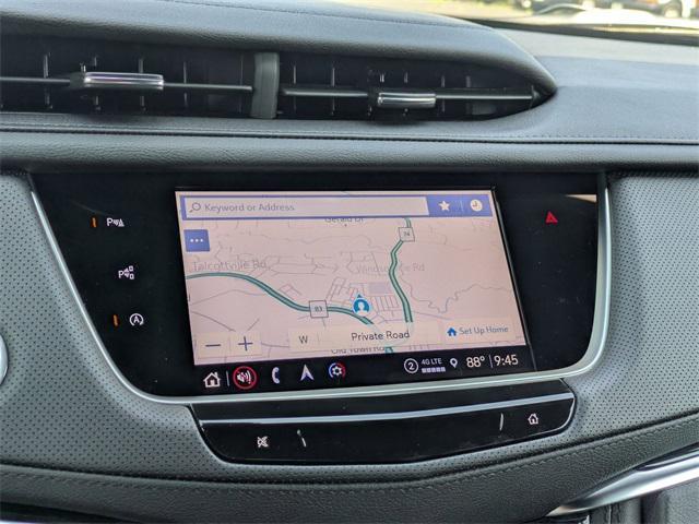 Photo of 2025 Crystal White Tricoat Cadillac XT5