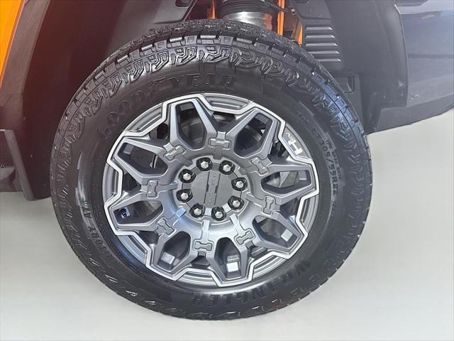 Photo of 2024 Afterburner Tintcoat (Orange) GMC HUMMER EV SUV