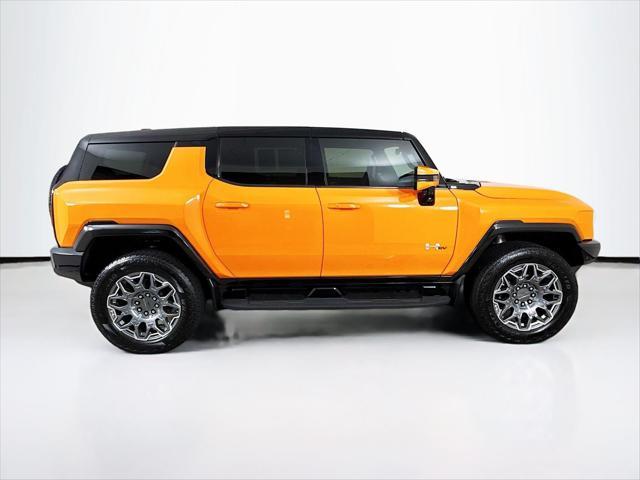 Photo of 2024 Afterburner Tintcoat (Orange) GMC HUMMER EV SUV