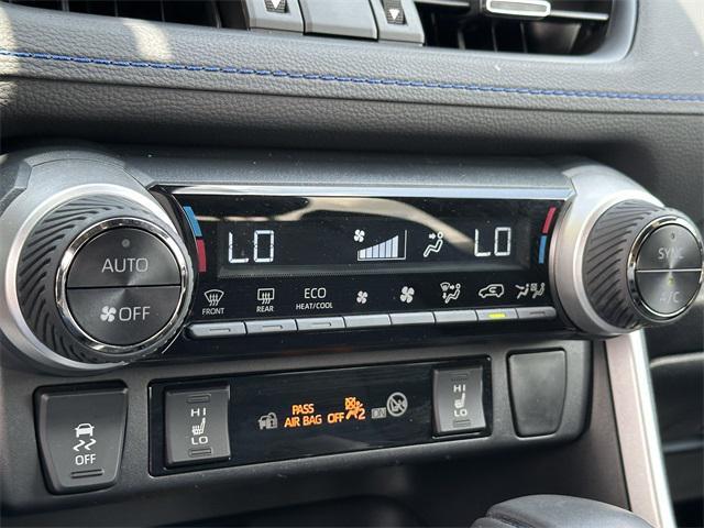 Photo of 2023 Silver Sky Metallic/Midnight Black Metallic Toyota RAV4 Hybrid