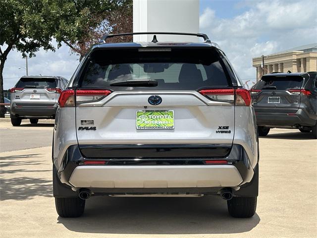 Photo of 2023 Silver Sky Metallic/Midnight Black Metallic Toyota RAV4 Hybrid