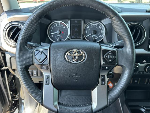 Photo of 2021 Midnight Black Metallic Toyota Tacoma