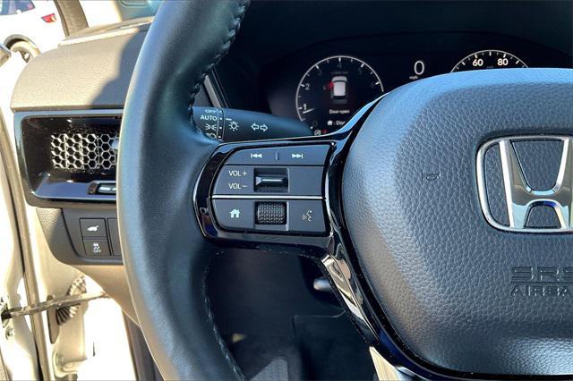 Photo of 2024 sparkle silver metallic Honda CR-V