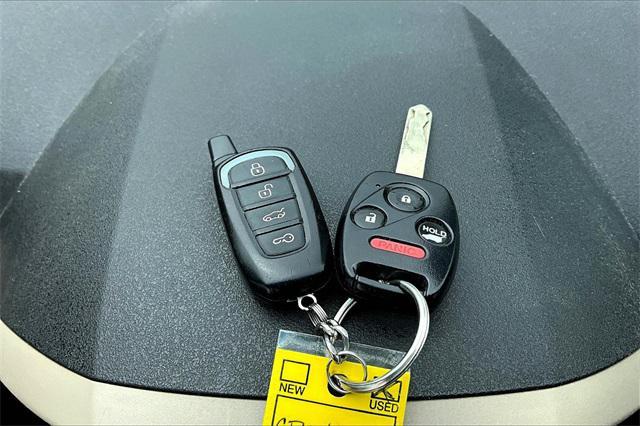 Photo of 2012 Dark Amber Metallic Honda Pilot