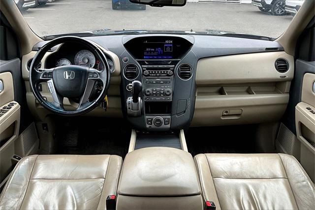 Photo of 2012 Dark Amber Metallic Honda Pilot