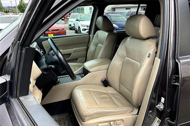 Photo of 2012 Dark Amber Metallic Honda Pilot