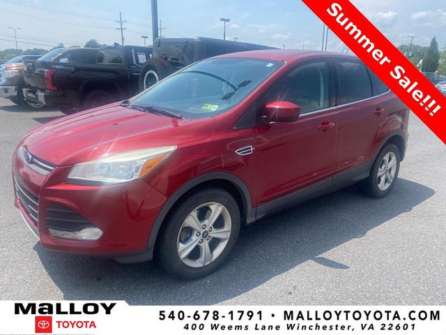 Photo of 2014 Ruby Red Tinted Clearcoat Ford Escape