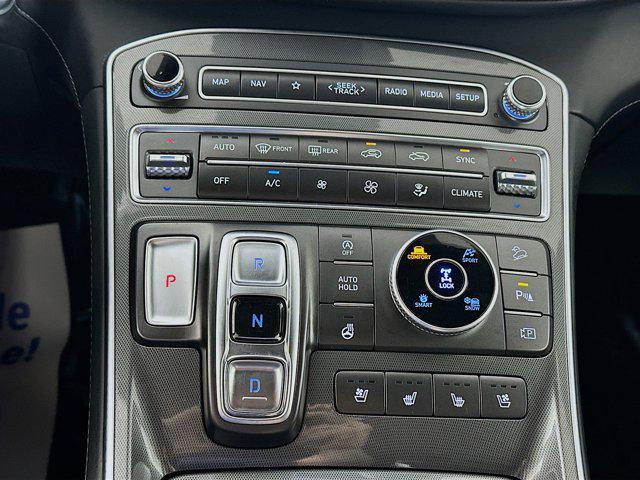 Photo of 2023 Calypso Red Hyundai SANTA FE