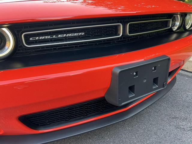 Photo of 2016 Go Mango Dodge Challenger