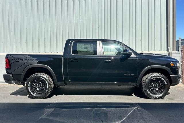 Photo of 2026 Diamond Black Crystal Pearl Coat RAM 1500