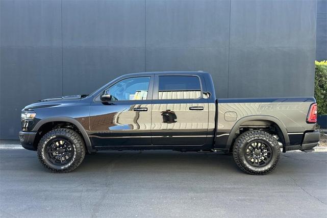 Photo of 2026 Diamond Black Crystal Pearl Coat RAM 1500