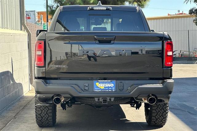 Photo of 2026 Diamond Black Crystal Pearl Coat RAM 1500