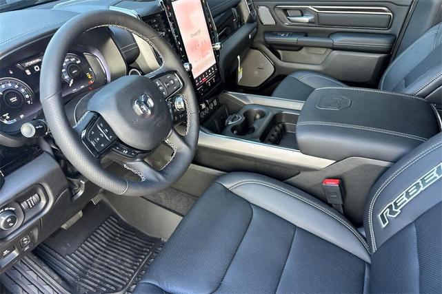 Photo of 2026 Diamond Black Crystal Pearl Coat RAM 1500