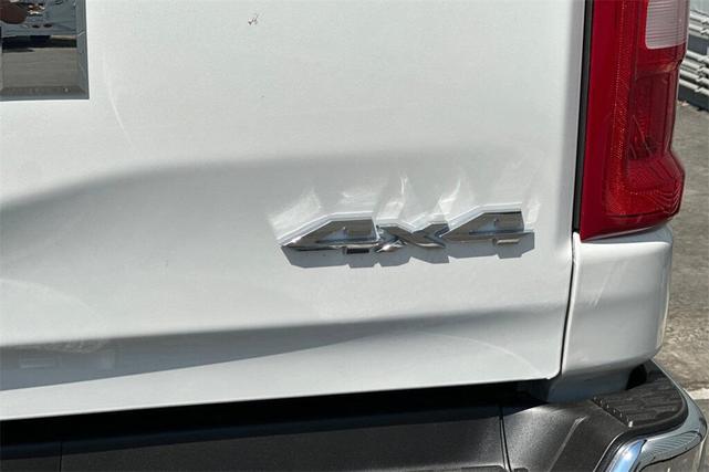 Photo of 2026 Ivory White Tri Coat Pearl Coat RAM 1500