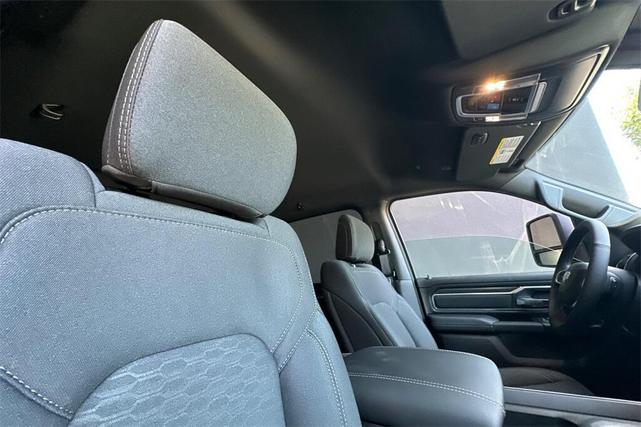 Photo of 2026 Diamond Black Crystal Pearl Coat RAM 1500