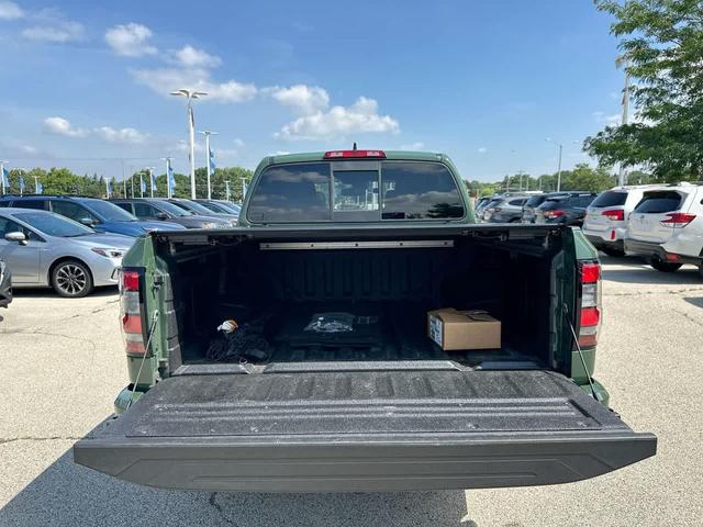 Photo of 2022 Tactical Green Metallic Nissan Frontier