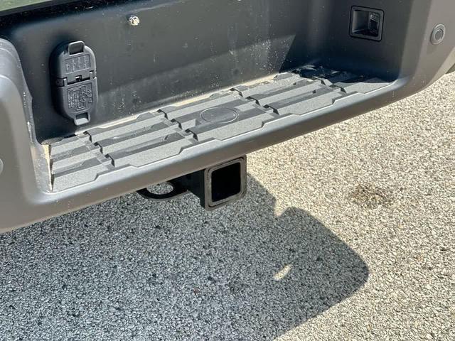 Photo of 2022 Tactical Green Metallic Nissan Frontier
