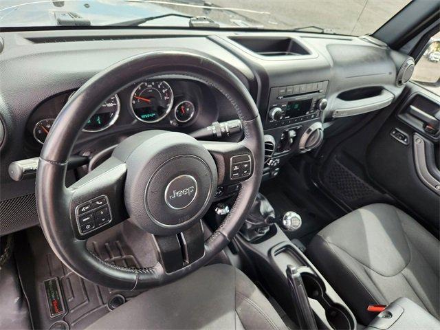 Photo of 2016 Granite Crystal Clearcoat Metallic Jeep Wrangler Unlimited