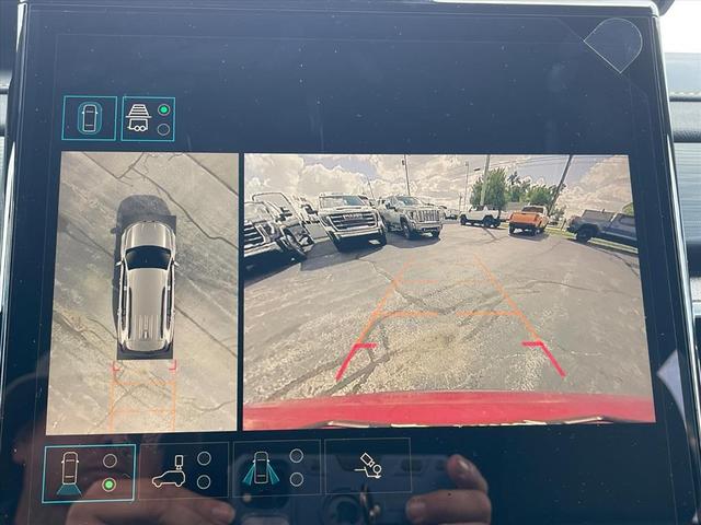 Photo of 2026 Volcanic Red Tintcoat GMC Acadia
