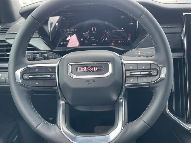 Photo of 2026 Volcanic Red Tintcoat GMC Acadia